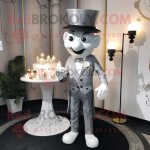 Bougie parfum�e argent�e mascotte redbrokoly personnage habill� d'un pantalon de costume et de b�rets ...