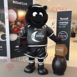 Bougie parfum�e noire mascotte redbrokoly personnage habill� d'un maillot de rugby et de sacs messenger ...