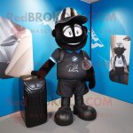Bougie parfum�e noire mascotte redbrokoly personnage habill� d'un maillot de rugby et de sacs messenger ...