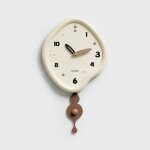 Horloge murale a pendule silencieuse forme irr�guli�re quartz 61 x 35 cm marron yonis