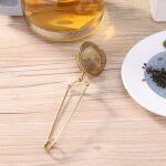 Infuseur a th� en acier inoxydable dor�, sph�re en maille, filtre a caf�, a herbes, a epices, poign�e, ...