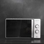 Micro - ondes de 23l avec minuterie 700w noir blanc Micro - ondes de 23l avec minuterie 700w noir blanc