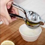 Presse agrumes presse citron manuel incassable en acier inoxydable , pour un maximum de jus, passe au ...