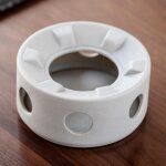 Th�i�re en c�ramique avec base chauffante et isolation, chauffe - lait pour usage domestique