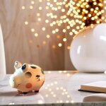 Tirelire en c�ramique cochon a pois gold