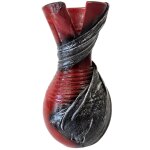 Vase artisanal rouge effet craquel� avec drap� de tissus gris 