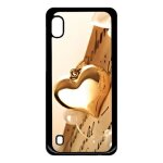 Coque pour smartphone - coeur d'or sur livre - compatible avec samsung galaxy a10 - plastique - bord ...