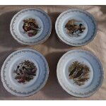 12 assiettes en porcelaine d�cor oiseaux