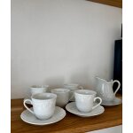 5 tasses, 4 soucoupes et un cr�mier en porcelaine philippe deshouli�res california