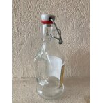Bouteille en verre avec anse et bouchon cramique refermable