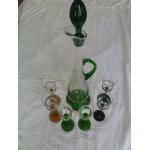 Superbe carafe a liqueur et ces 6 verres a pieds Superbe carafe a liqueur et ces 6 verres a pieds