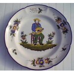 Faence saint clment - grande assiette plate - musicien a la mandoline - signe pd ou pp 24 - diamtre ...