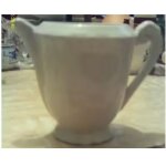 Pichet a lait - en porcelaine blanche Pichet a lait - en porcelaine blanche