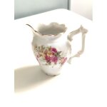 Pot a lait en porcelaine ancienne