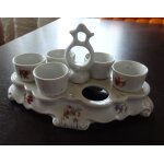 Serviteur a oeufs. 5 coquetiers et son présentoir. fin 1930. manque un coquetier. Serviteur a oeufs. 5 coquetiers et son présentoir. fin 1930. manque un coquetier.