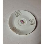 Sous tasse en porcelaine blanche fleurie avec dorure