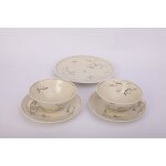 T�te - a - t�te en porcelaine de limoge couleur cr�me avec dorures et d�cor japonisant. 2 tasses, 2 soucoupes ...