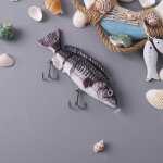Leurre de p�che robotis� compos� de 4 sections articul�es, app�t artificiel de type poisson nageur, rechargeab ...