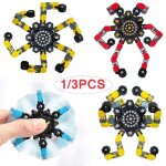 1 / 3pc enfants déformable soulagement du stress jouet doigt spin haut fidget spinner transformable chaîne ... 1 / 3pc enfants déformable soulagement du stress jouet doigt spin haut fidget spinner transformable chaîne ...