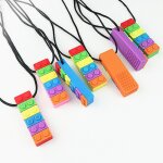 Anneau de dentition portable en silicone pour b�b�, briques arc - en - ciel a m�cher, s�r, doux, autisme, ...