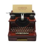 Bote a musique en forme de machine a ecrire ¿ objet dcoratif en plastique marron avec mlodies ¿ ...