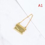 Chane en mtal pack avec sac a main de shopping en miniature pour poupe, vtements et accessoires disponible ...