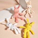 Un jouet en peluche lapin de dessin anim de pques de couleur alatoire avec chiens, jeu interactif ...
