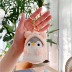 Jouet en peluche mignon pingouin japonaise changeable de couleur en pink et or avec button de hauteur ...