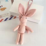 Lapin en peluche pouvant servir de décoration de robe ou de porte - clés, idéal comme décoration d'une ... Lapin en peluche pouvant servir de décoration de robe ou de porte - clés, idéal comme décoration d'une ...