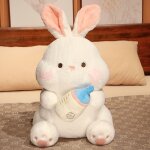 Mignon bébé biberon lapin poupée en peluche jouet assis petit lapin blanc poupée enfants réconfort poupée ... Mignon bébé biberon lapin poupée en peluche jouet assis petit lapin blanc poupée enfants réconfort poupée ...