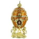 Oeuf ecrin musical faberg dor avec couronne - la flte enchante (mozart)