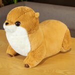 Peluche loutre poupe furet loutre couche dormant sur le lit cheveux de poupe loutre brun clair - 50 ...