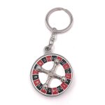 Porte - clés pendentif en métal représentant un jeu de roulette de casino Porte - clés pendentif en métal représentant un jeu de roulette de casino