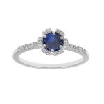 Bague argent rhodi fleur oxydes bleu fonc et blancs sertis