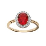 Bague plaqué or grand diamètre centre oxyde rouge et contour oxydes blancs sertis Bague plaqué or grand diamètre centre oxyde rouge et contour oxydes blancs sertis