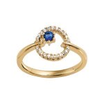 Bague plaqué or ronde 1 verre bleu foncé contour oxydes blancs sertis Bague plaqué or ronde 1 verre bleu foncé contour oxydes blancs sertis