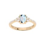 Bague plaqué or topaze bleu et oxydes blancs sertis Bague plaqué or topaze bleu et oxydes blancs sertis