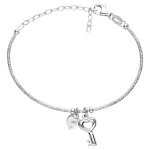 Bracelet argent rhodi semi rigide pampilles coeur et clef rglable