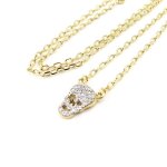 Collier plaqu or  tte de mort  blanc