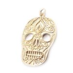 Pendentif plaqu or  tte de mort  dor