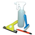 Kit de pose pour films adh�sifs � fixer sur les vitres