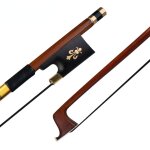 Archet de violon taille 4 / 4, baton rond, poigne en peau de lzard, crin noir avec grenouille en ebne, ...