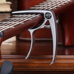 Capodastre de guitare acoustique classique en alliage d'aluminium métal pince a changement rapide réglage ... Capodastre de guitare acoustique classique en alliage d'aluminium métal pince a changement rapide réglage ...