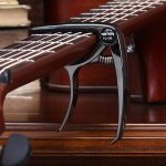 Capodastre de guitare en alliage d'aluminium, pince de tuner de guitare professionnelle, déclencheur ... Capodastre de guitare en alliage d'aluminium, pince de tuner de guitare professionnelle, déclencheur ...