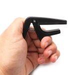 Capodastre professionnel en plastique, 4 cordes, pince de réglage a changement rapide pour guitare hawaïenne, ... Capodastre professionnel en plastique, 4 cordes, pince de réglage a changement rapide pour guitare hawaïenne, ...