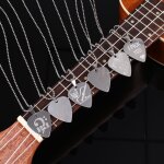 Collier avec mdiator pour guitare acoustique, electrique ou basse, plectre fin en mtal, sur pendentif, ...