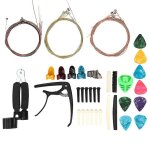 Kit d'accessoires pour guitare a changer, comprenant cordes, capodastre, pince pour médiator en celluloïd, ... Kit d'accessoires pour guitare a changer, comprenant cordes, capodastre, pince pour médiator en celluloïd, ...