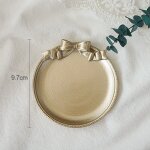 Ronde argent - assiette vintage dorée avec nâ¿ud papillon, accessoires de studio photo, pour bijoux, ... Ronde argent - assiette vintage dorée avec nâ¿ud papillon, accessoires de studio photo, pour bijoux, ...