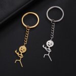 Fei yu - porte - cls pendentif petit bonhomme aux deux doigts du milieu et au visage souriant