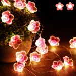 Guirlande lumineuse avec 40 led en forme de fleur de cerisier rose, à piles, pour noël, chambre de fille, ... Guirlande lumineuse avec 40 led en forme de fleur de cerisier rose, à piles, pour noël, chambre de fille, ...